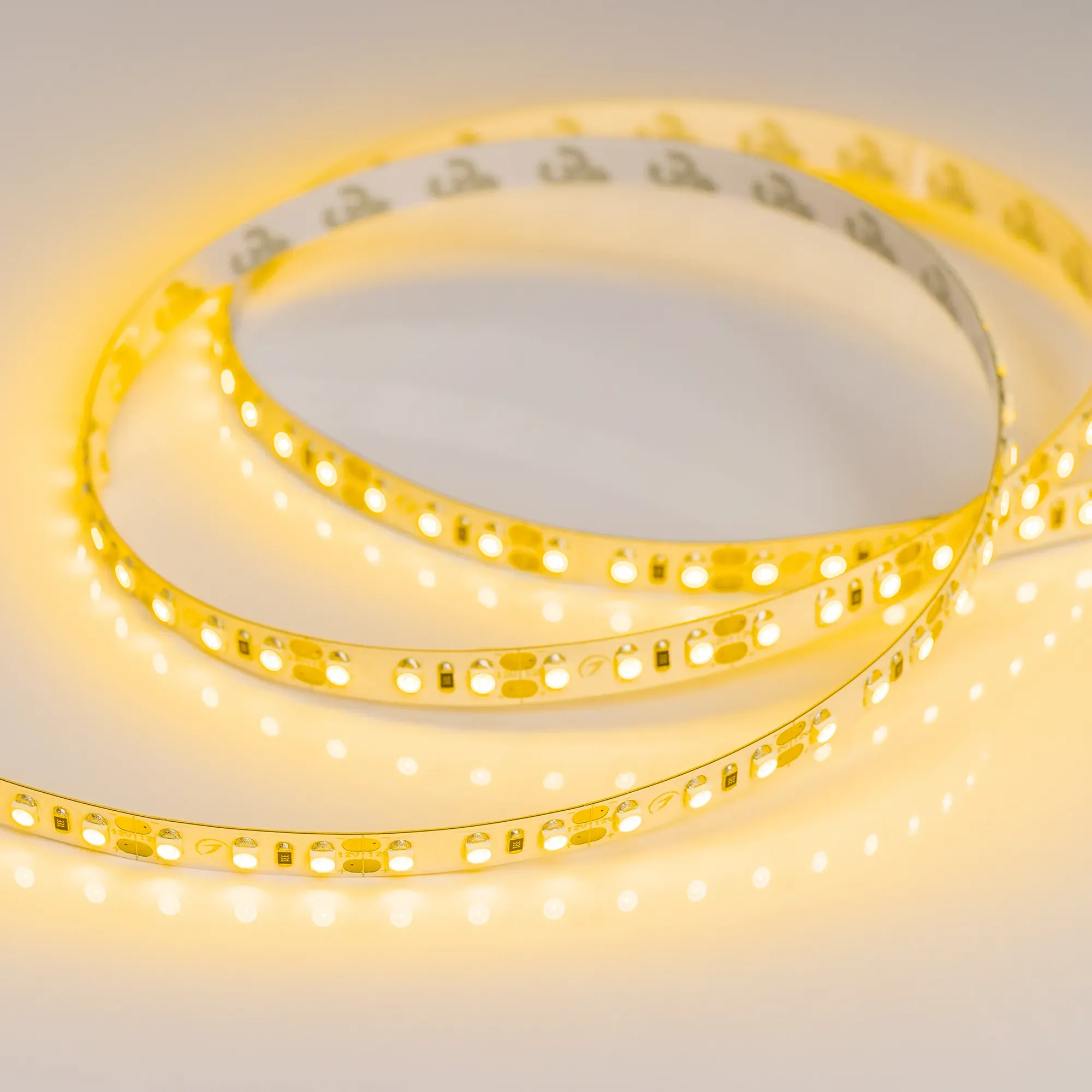 Лента светодиодная RT-A120-8mm 12V Yellow (9.6 W/m, IP20, 2835, 5m) (Arlight, 9.6 Вт/м, IP20) - изображение товара