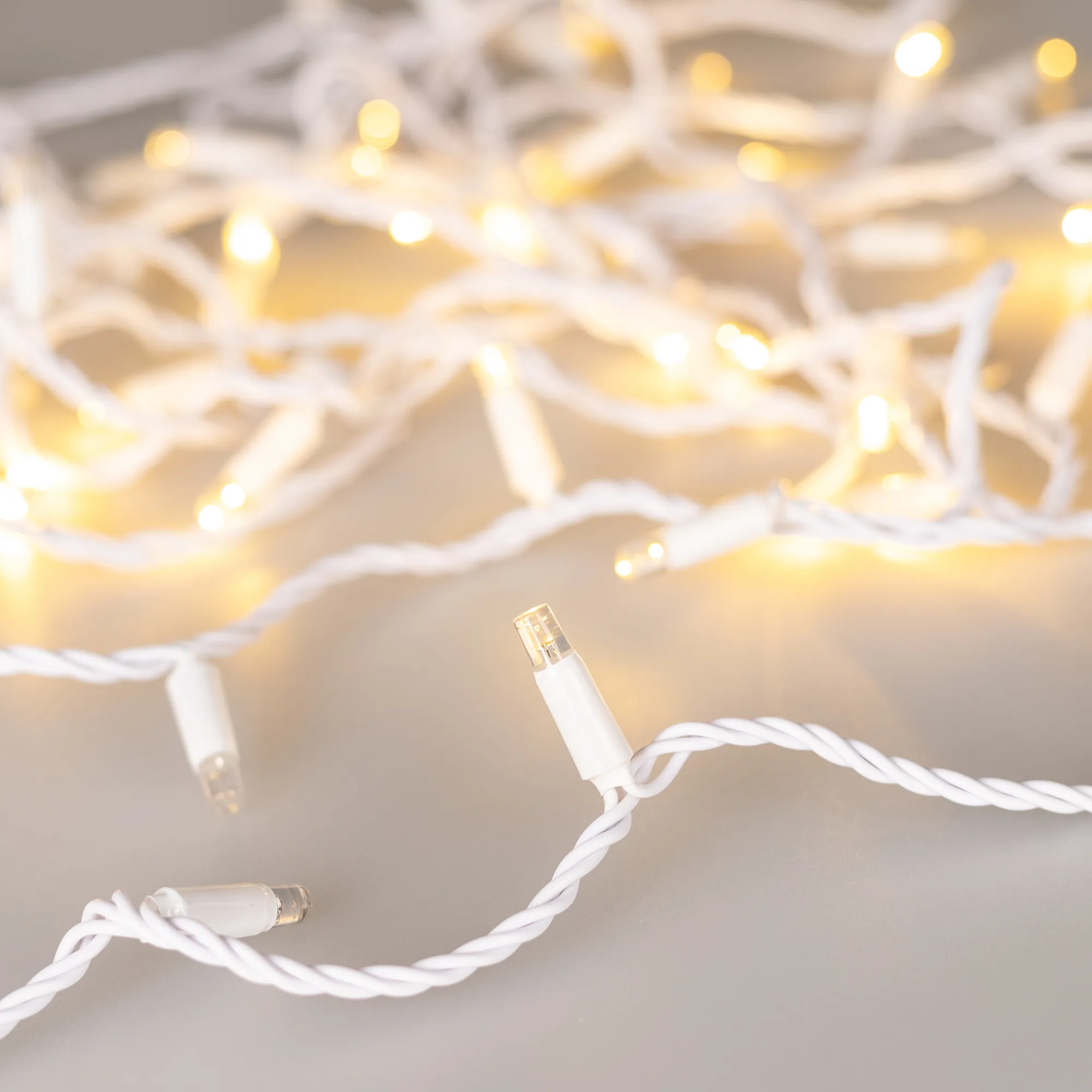 Светодиодная гирлянда ARD-STRING-CLASSIC-10000-WHITE-100LED-PULSE Warm (230V, 7W) (Ardecoled, IP65) - изображение товара